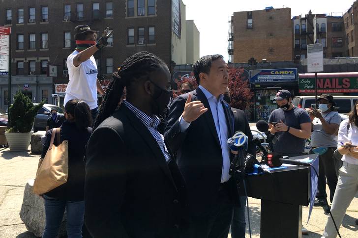 Andrew Yang and Edwin Raymond in Brooklyn as a heckler tries to interrupt the event.